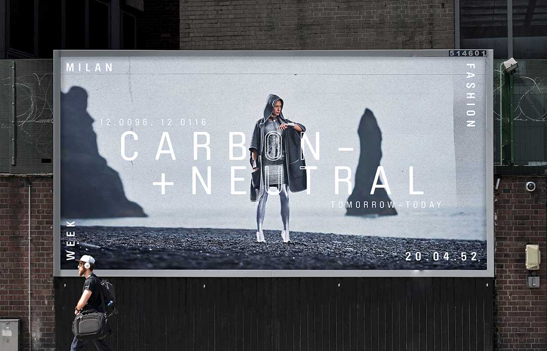 billboard mock up of a carbon neutral fashion brand with a futurist style dress standing on a beach