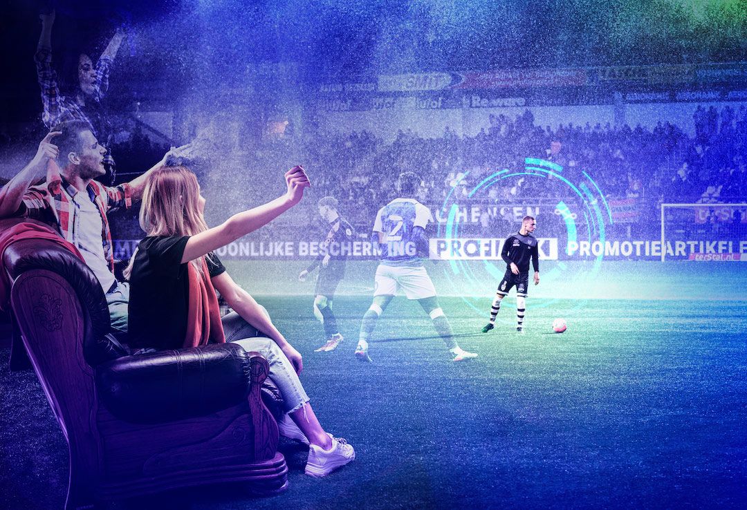 olivia sitting on couch watching holomatch with friends