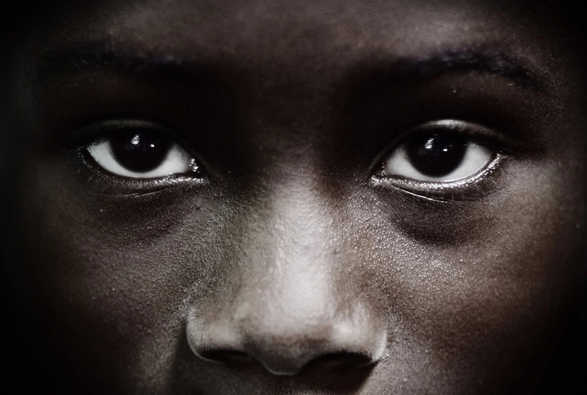 Close-up of a woman staring into the camera