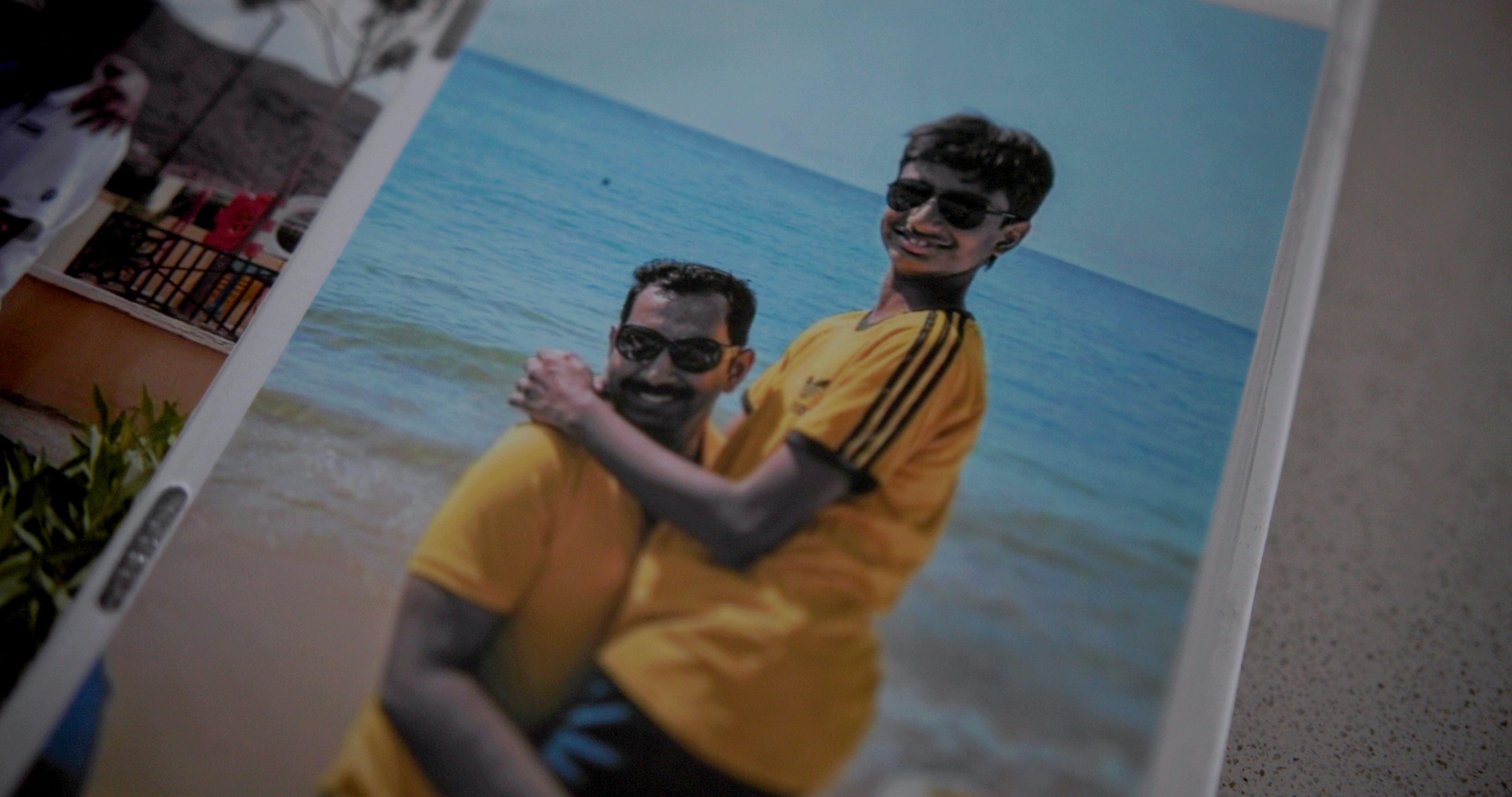 Vedant with his father at the beach